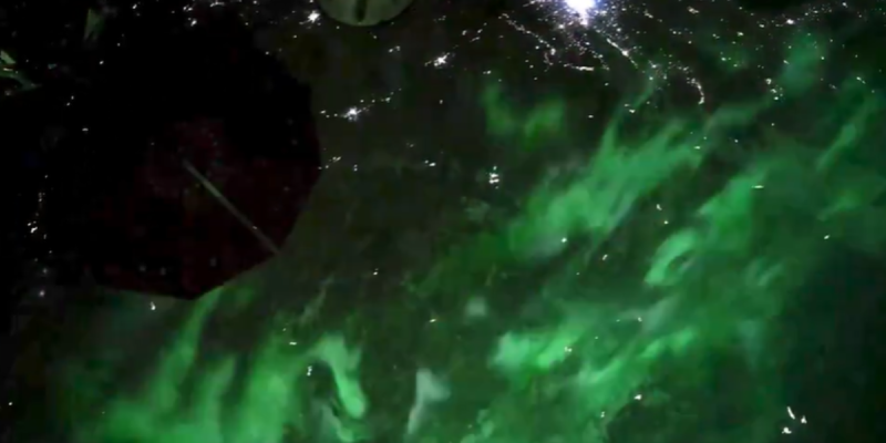 NASA astronaut captures stunning green auroras from the ISS.