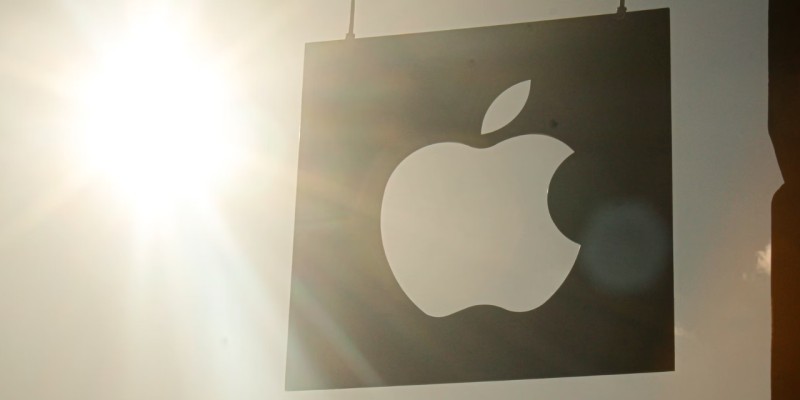 Apple fires 185 employees for charity program salary fraud.