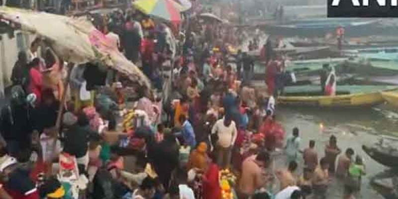 Indian devotees celebrate Makar Sankranti with holy dips and kite flying.