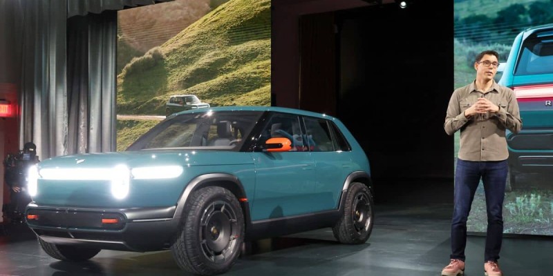 Rivian secures $6.6B DoE loan for Georgia plant, boosting stock.