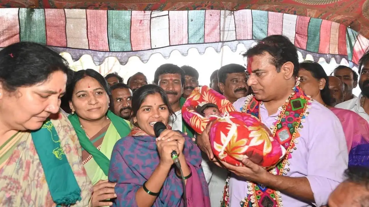 కేటీఆర్ పసిపాపకు నామకరణం: లగచర్ల పోరాట యోధురాలి కుమార్తెకు 'భూమి నాయక్' అని నామకరణం